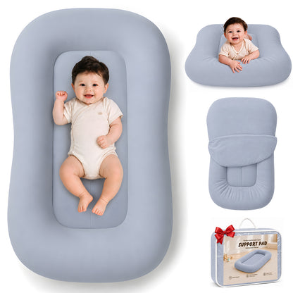 Mapotf Baby Lounger in Navy Blue – portable baby nest with removable cover, shown with happy baby and gift packaging
